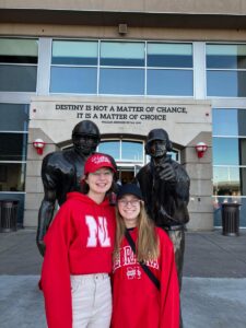 two young women pose on a visit to University of Nebraska Lincoln campus